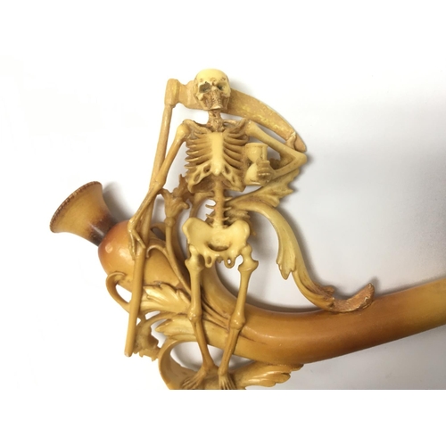 810 - A cased skeleton tobacco pipe