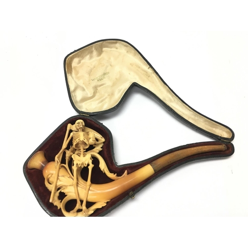 810 - A cased skeleton tobacco pipe