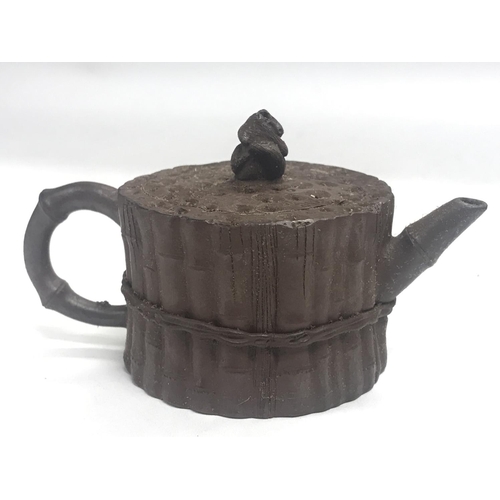 902 - A Chinese yixing zisha teapot , 6cm tall. 12cm wide. No obvious damage or restoration. Postage categ... 