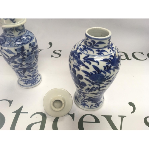 927 - Three blue and white Oriental vases, largest approx 17cm tall. Shipping category D.