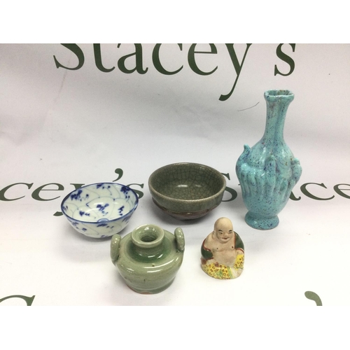 938 - Five small Oriental ceramics comprising tea bowls, vases etc. Shipping category D.