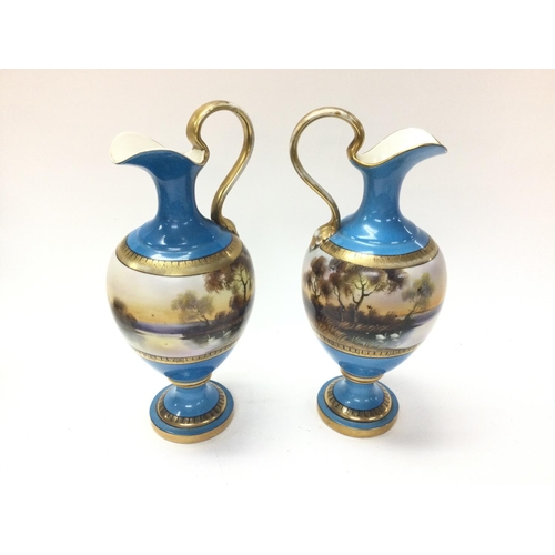 943 - A pair of Noritake vases 25cm tall Postage D