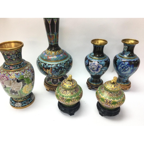 944 - Six Chinese cloisonnÃ© vases in various sizes and designs.