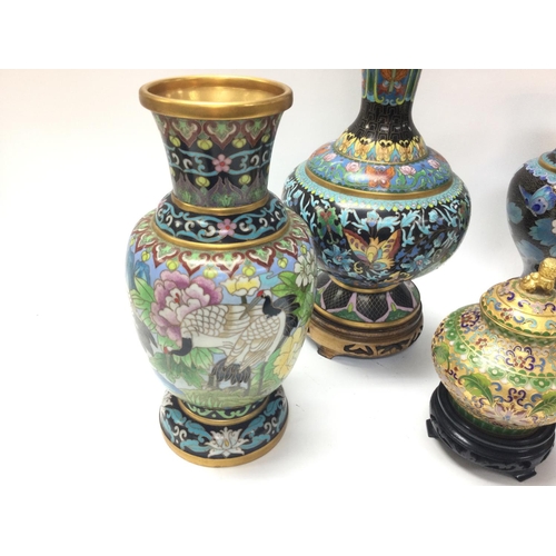 944 - Six Chinese cloisonnÃ© vases in various sizes and designs.