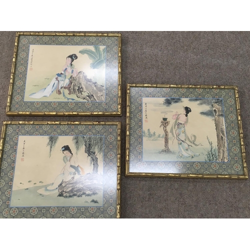 946 - Three framed Japanese silk painting. Postage D NO RESERVE