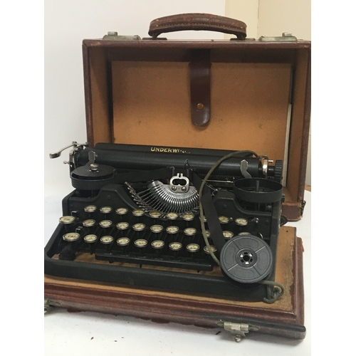 2113 - A Vintage leather surgeon case fitted with medical instruments and a Vintage typewriter and a typewr... 