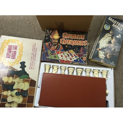 103 - A Collection of vintage board games including Chinese Chequers, Diplomat chess set, Admirals etc