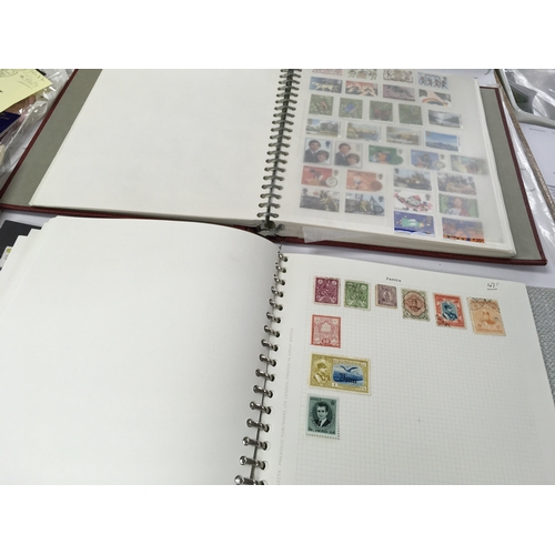 105 - A large collection of assorted world stamps including a number of UK stamps.