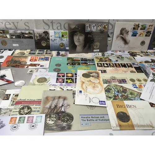 108 - A collection of coin and stamp presentations packs. Postage B