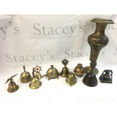 126 - A large Collection of brass bells with various designs