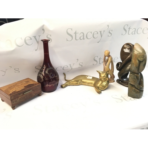 14 - A Collection of assorted items including a brass cat, cranberry vase, wooden music box, contemporary... 