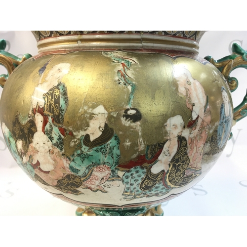 176 - A Chinese vase decorated in gilt and with panels of figures and a peacock , twin handled design, top... 