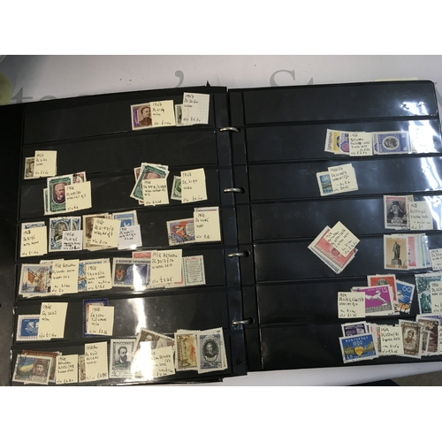 179 - A collection of world and British used and unused stamp albums and loose stamps including Portuguese... 