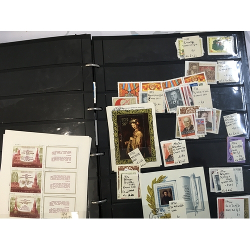 179 - A collection of world and British used and unused stamp albums and loose stamps including Portuguese... 