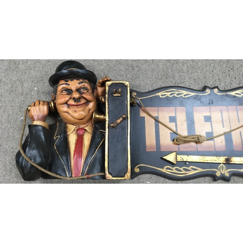 202 - A Laurel and Hardy telephone sign with a gold coloured arrow that is adjustable/able to rotate. It m... 