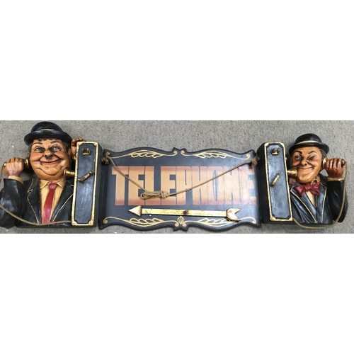 202 - A Laurel and Hardy telephone sign with a gold coloured arrow that is adjustable/able to rotate. It m... 