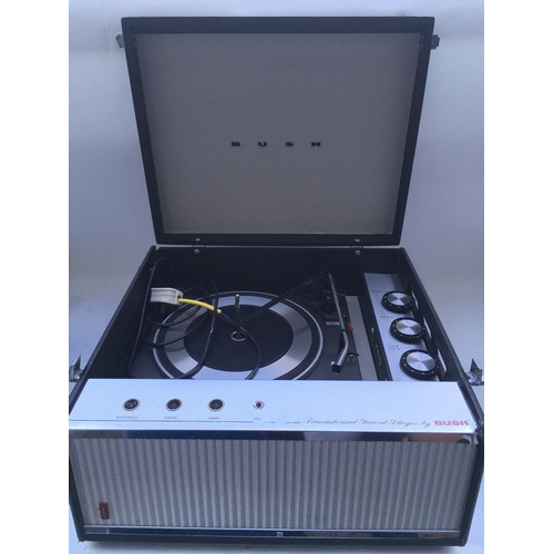 210 - Two vintage portable record players comprising a circa 1960s Bush example and a KB radio tune time m... 