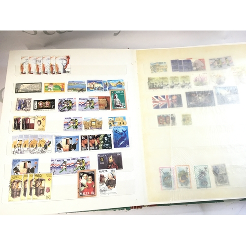 211 - World Stamp albums including used and unused stamps from Barbados, Cyprus, Gibraltar, UK, Canada etc