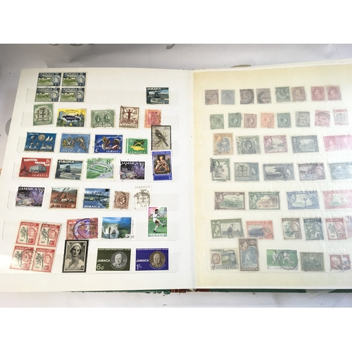 211 - World Stamp albums including used and unused stamps from Barbados, Cyprus, Gibraltar, UK, Canada etc