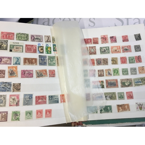 211 - World Stamp albums including used and unused stamps from Barbados, Cyprus, Gibraltar, UK, Canada etc