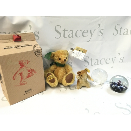 265 - Stamp albums, hardwood elephant figures, Merrythought bear and cut glass vases