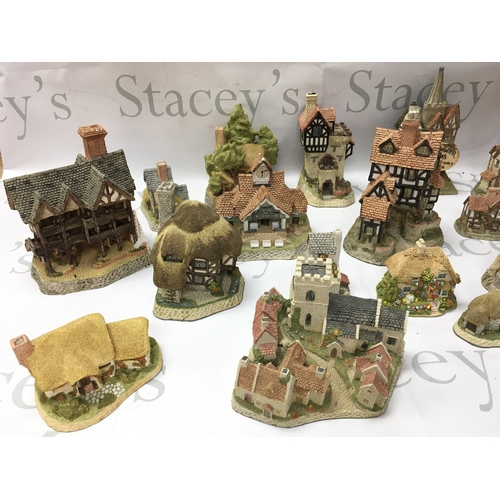 277 - A collection of David Winter cottages and a Wedgewood Rupert clock. No reserve