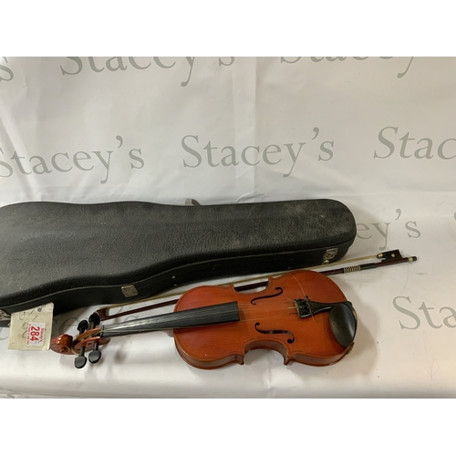 284 - 2 violins, 1 including a case, made in China (Skylark) and the other violin is also made by Skylark ... 