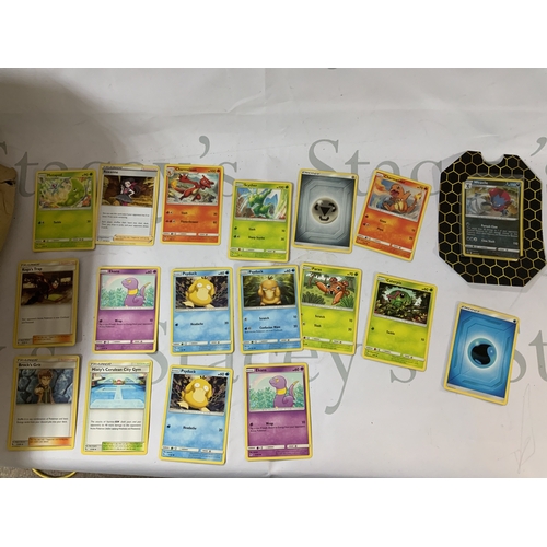 285 - A collection of Pokemon cards, including a sealed Sun and Moon Cosmic Eclipse Unseen Depths theme de... 