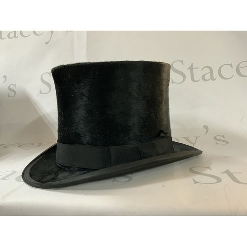 287 - A silk antique top hat made of fur, Shorland.