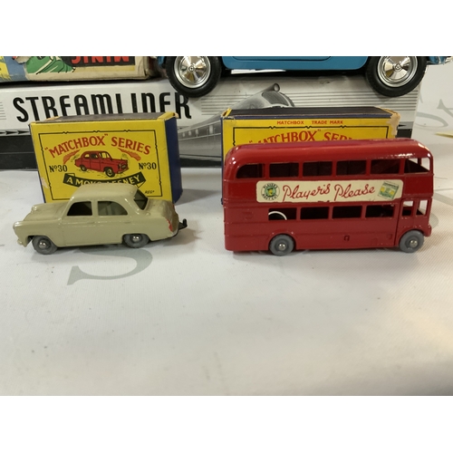 288 - A mixture of vintage toys and vehicles, including a chrome plated tin Streamliner made by Schylling ... 