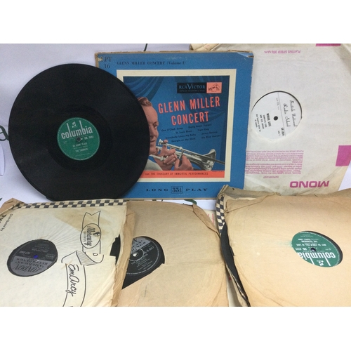 296 - A record case and a bag of 78s and LPs comprising many classical and pop titles.