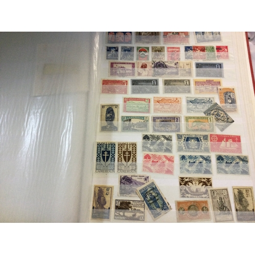 346 - A collection of stamp albums from multiple different countries in the world.