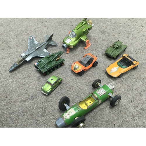 35 - A Collection of Playworn toys including Triang , Matchbox, Dinky. Postage category C