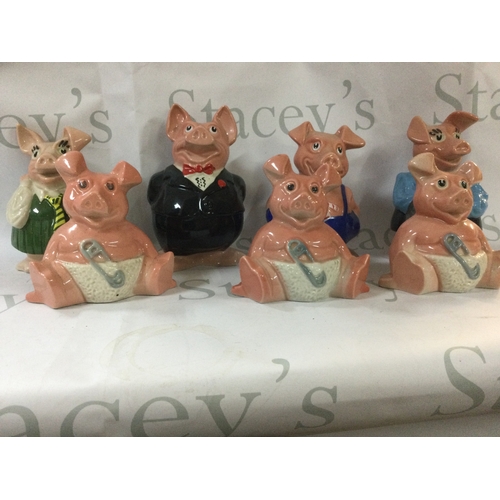 352 - A collection of antique pig money boxes from 1980s NatWest. Includes all 5 of the pigs and 2 extra s... 