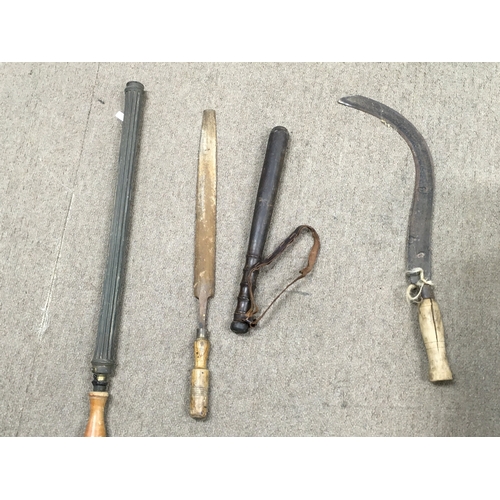 36 - A Collection of various vintage tools including a baton, sickle, chisel