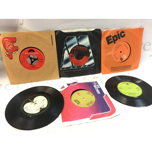 38 - A Collection of rock and pop 7 inch singles including Alice Cooper, Trex, ELO, David Bowie etc.