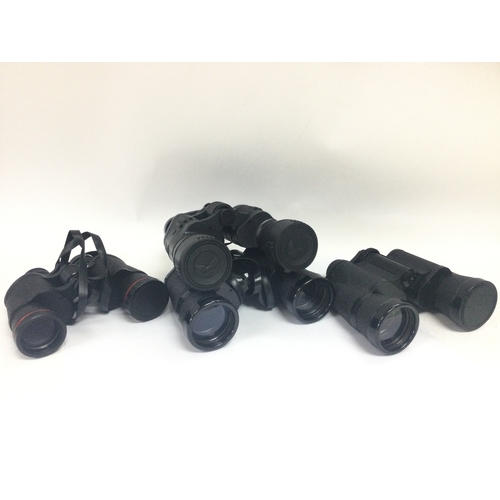 385 - A collection of vintage cased binoculars including Shira Zenith 10x50, Halina 16x50, Ranger Crest 20... 