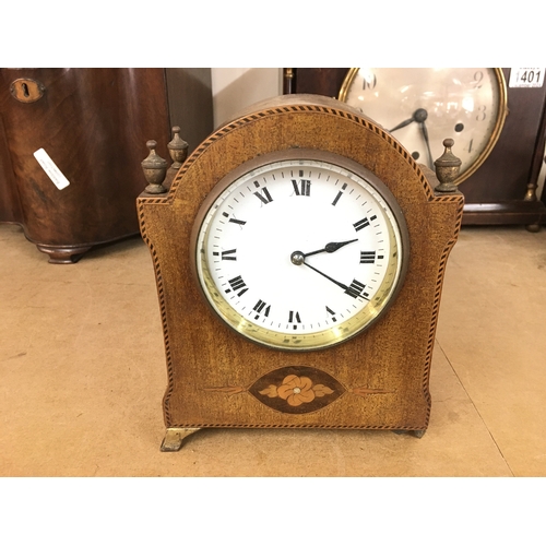 392 - A small Edwardian mantle clock. 18cm tall by 14cm wide. NO RESERVE