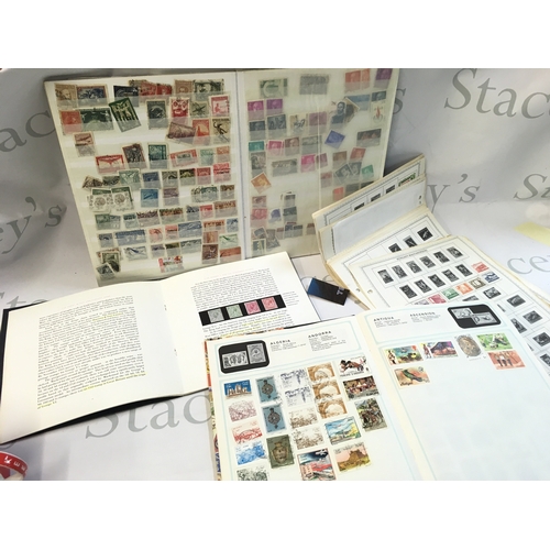 419 - A large collection of World Stamp albums containing unused and used stamps from Germany, Bulgaria, C... 