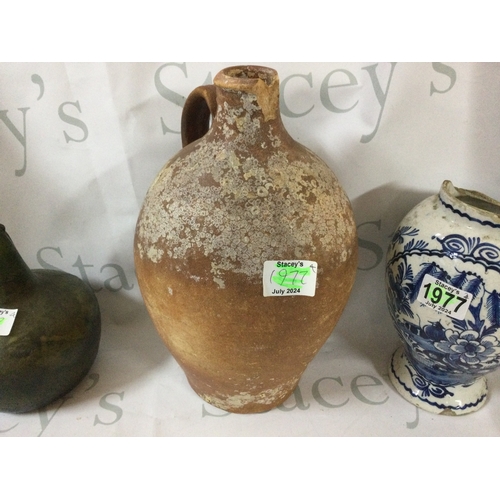 424 - A collection of 4 antique pottery vases.