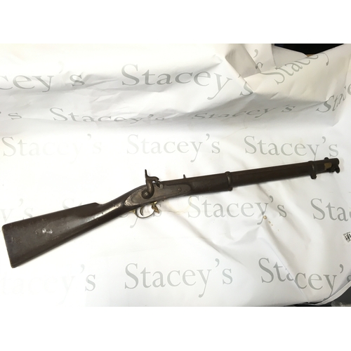 469 - A replica flintlock rifle, with functioning mechanism. 93cm long