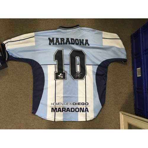 487 - A signed Diego Maradona shirt, with a certificate of authenticity.