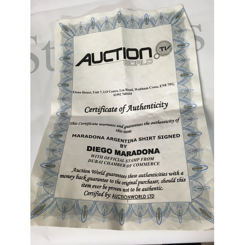 487 - A signed Diego Maradona shirt, with a certificate of authenticity.