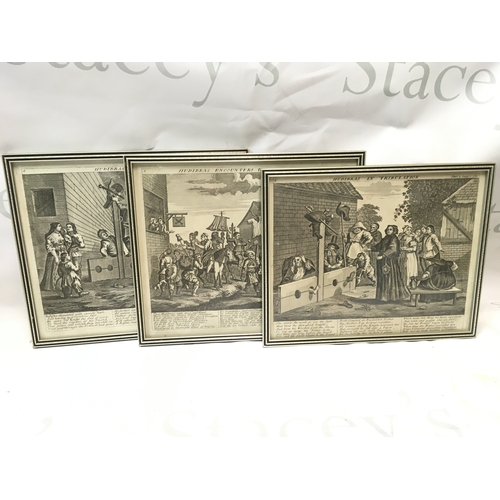 489 - A collection of three framed engravings in the Hogarth style