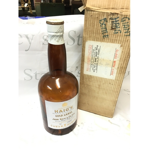 491 - A large Haigs Blended Scotch Whisky Gold Label empty advertising bottle. 40cm tall.