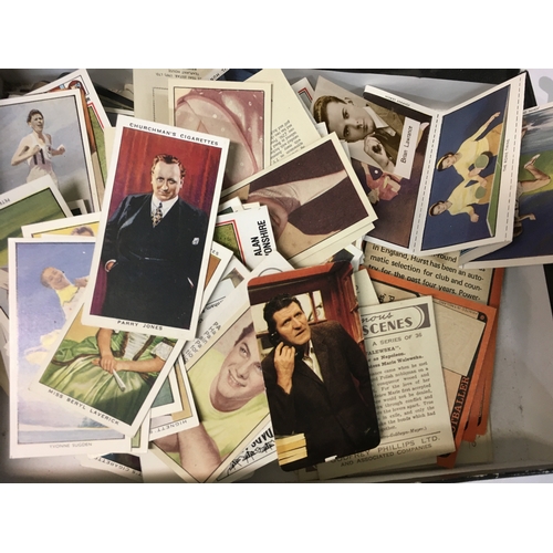 495 - A collection of cigarette cards, A&BC football cards, and more. Also, the cards include the most fam... 