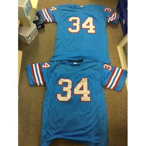 508 - A collection of items signed by Earl Campbell former professional American football player including... 