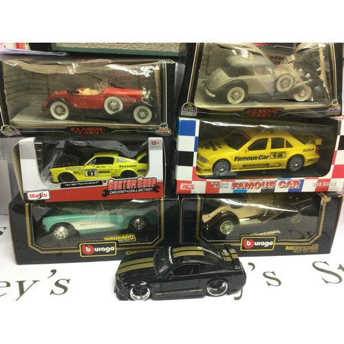 532 - A box of boxed die cast vehicles, mainly 1/18 scale plus a box of Mega Blocks construction models (2... 