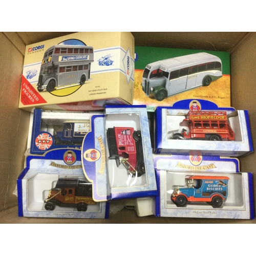 535 - A box of die cast vehicles comprising mainly boxed buses.