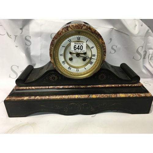 544 - An antique Victorian marble mantle clock. A slate mantle clock with Roman numeral face. 45 cm by 30c... 